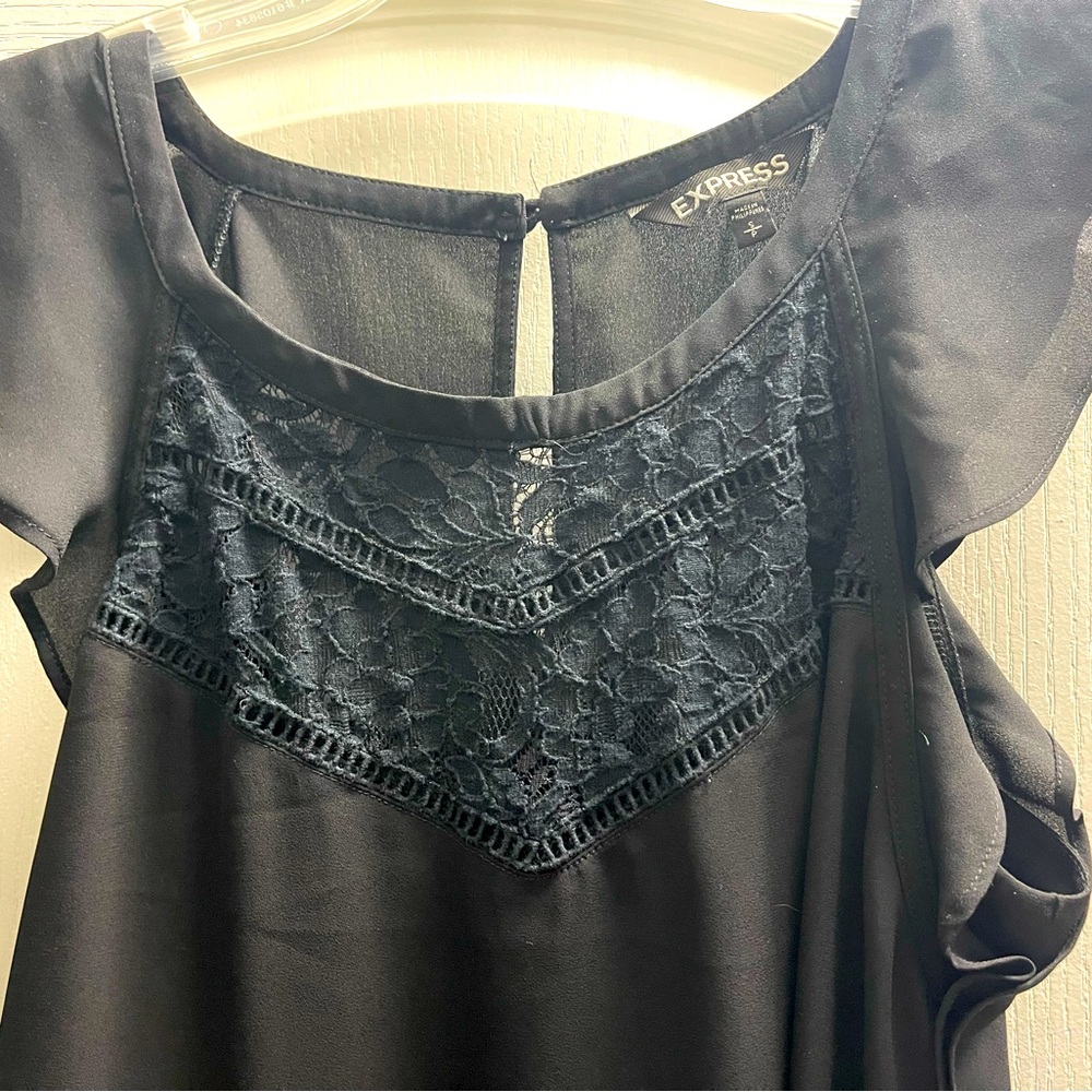 Black Express ruffle and lace blouse.